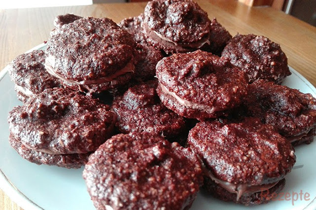 Photo of Nussbaiser mit Zartbitterschokolade