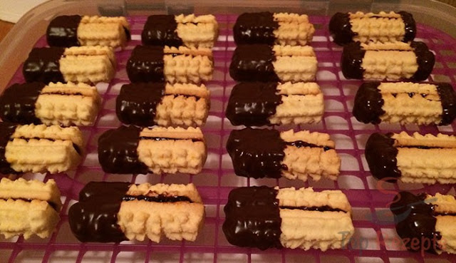 Photo of Traditionelles Spritzgebäck mit Schokolade