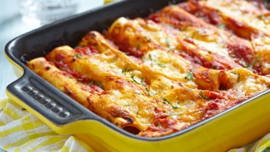 Photo of Cannelloni mit fleisch-ricotta-füllung auf tomatensauce